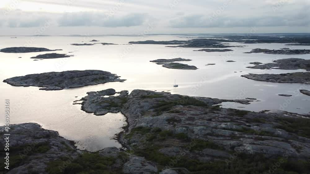 Flying with drone over the archipelago with single sailing yachts near Vrangö near Göteborg in Sweden Flying with drone over the archipelago with single sailing yachts near Vrangö near Göteborg in Sweden