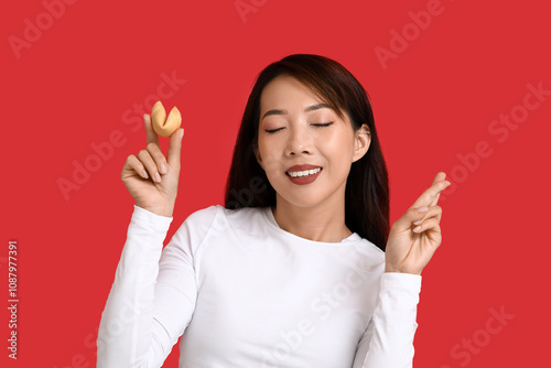 Young Asian woman with fort...