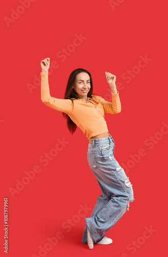 Happy middle-aged woman dan...