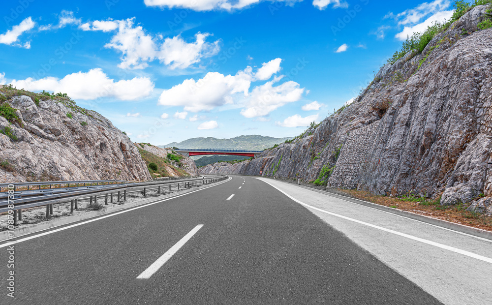 Countryside highway in a beautiful mountainous area.