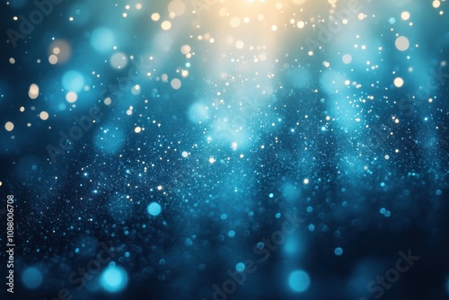 Abstract blue and gold bokeh background with glowing particles and light rays.