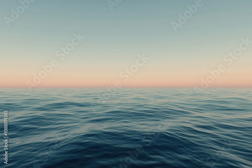 A serene seascape with calm waters and a pink-hued sky at dusk.