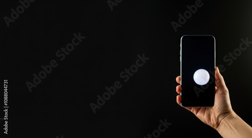 Wallpaper Mural Hand of person holding smartphone with blank screen illuminated by single light source Torontodigital.ca