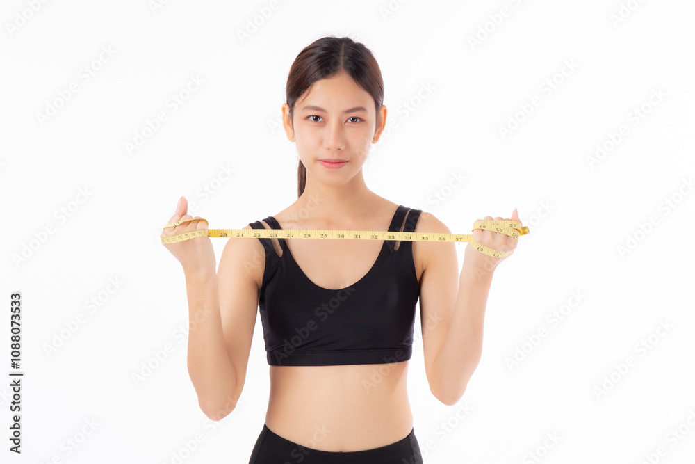 Portrait happy young asian woman in sportswear holding measure tape isolated white background, girl care body with workout or exercise, dieting and cellulite, sport and loss weight for health.