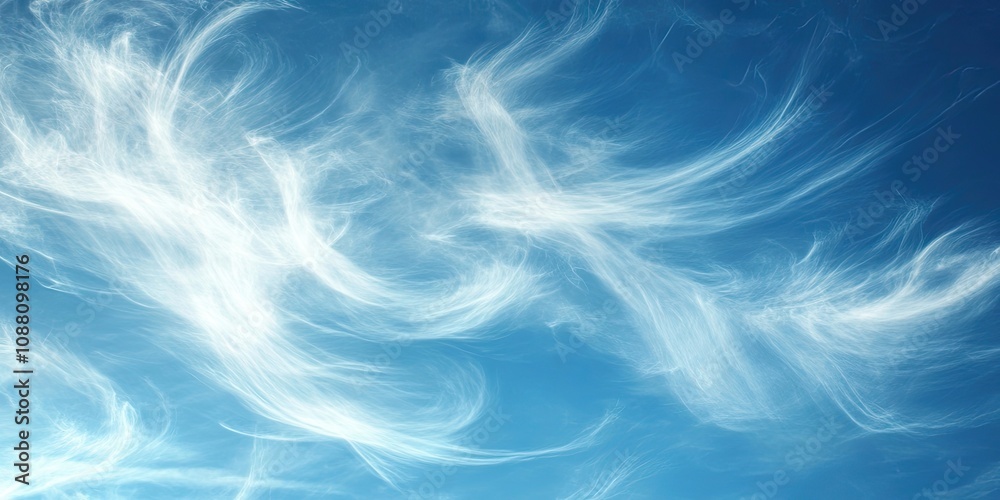 Obraz premium A lovely blue sky featuring light, delicate clouds.
