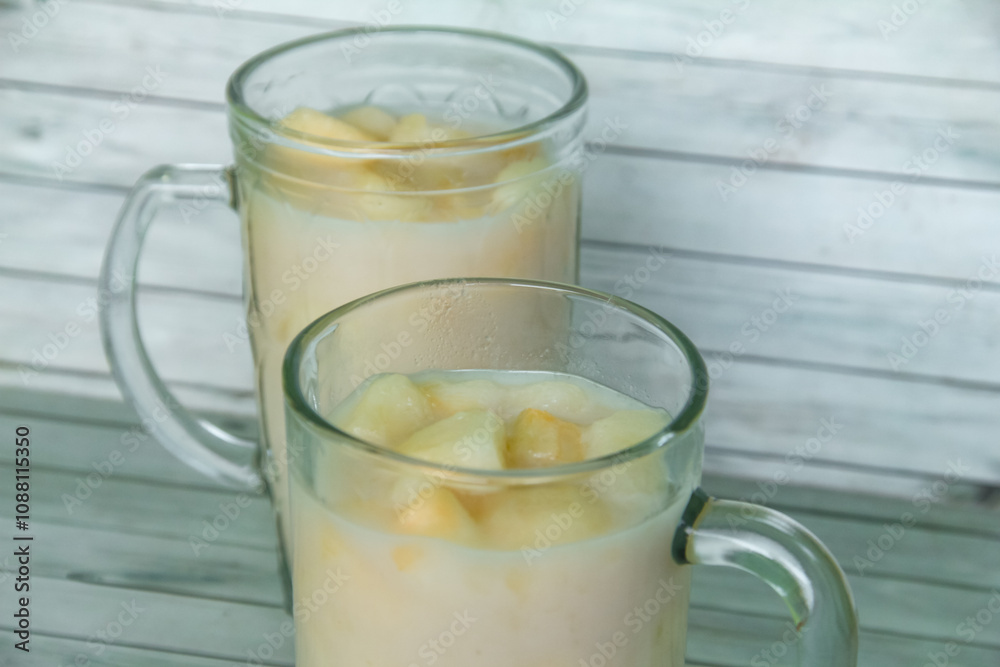 Drink from Suri Cucumber and fresh coconut milk, suri cucumber or Cucumis melo L. var. Naudin reticulatus is the fruit of a creeping plant with a fragrant aroma Drink from Suri Cucumber and fresh coconut milk, suri cucumber or Cucumis melo L. var. Naudin reticulatus is the fruit of a creeping plant with a fragrant aroma