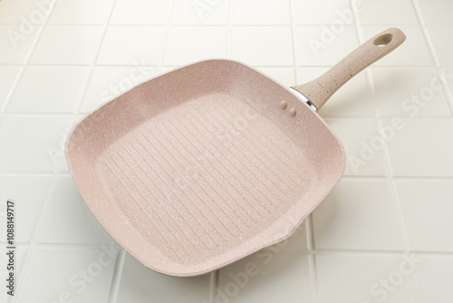 Ceramic frying pan on white background.
 photo