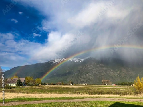 Rainbow on the Columbia Mountains, Columbia Falls Montana. photo