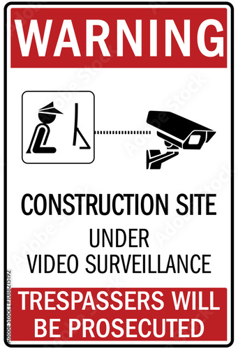 Job safety signs construction site under video surveillance. Trespassers will be prosecuted