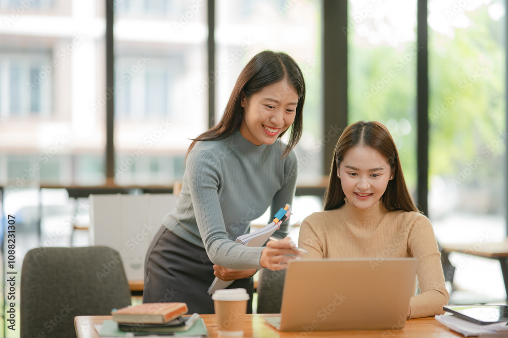 Asian Business Group Chat about graph work Present in meetings, in the office