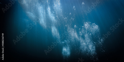 Dreamlike underwater world, universe and galaxy. Underwater photo from the deep blue ocean.