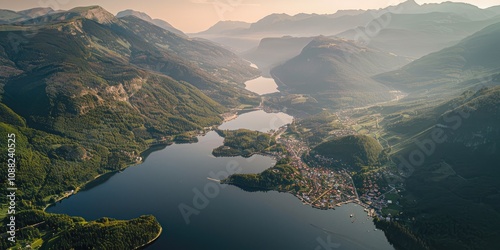 Fototapeta Naklejka Na Ścianę i Meble -  Aerial View of Hallstatt in Summer with Lake, Mountains, and the Village's Iconic Charm