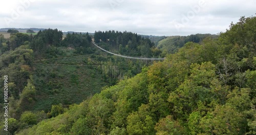 Aerial drone video of The Geierlay Suspension Bridge, pedestrians bridge, spans the Morsdorfer Bachtal. Adventure destination. photo