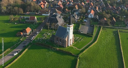 Drone video of the Little church of Den Hoorn at the Wadden island of Texel, The Netherlands. photo