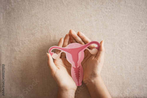 woman holding uterus, female reproductive system , woman health, PCOS, gynecologic and cervix cancer concept