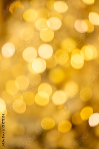 A blurry yellow background with many small circles