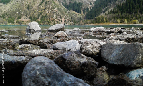stones near a mountain lake
