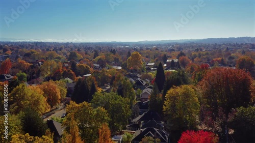  aerial view of eastside of Portland, Oregon vibrant neighborhoods adorned with fall foliage.