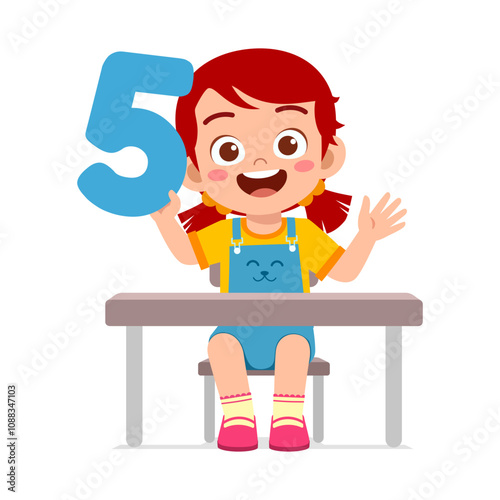 little kid holding number for math study