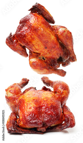 Whole roasted chicken against white background