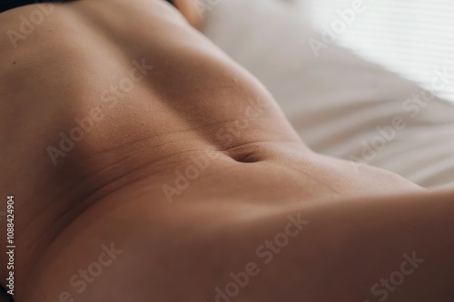 close up of a woman belly