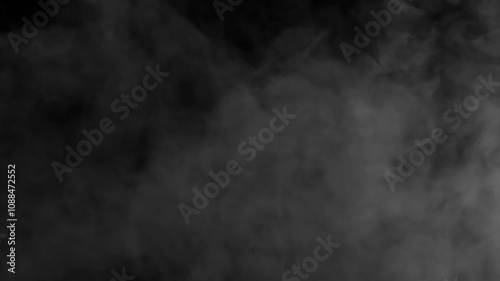 White Smoke is Slowly Moving. Gray smoke on a black background slowly dissipates and disappears from the screen