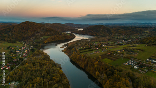 Fototapeta Naklejka Na Ścianę i Meble -  Breathtaking Autumn Aerial View of Solina Lake and Bieszczady Mountains