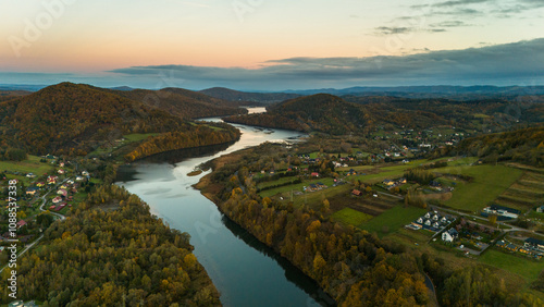 Fototapeta Naklejka Na Ścianę i Meble -  Aerial View of Solina Lake and Vibrant Autumn Colors in Bieszczad