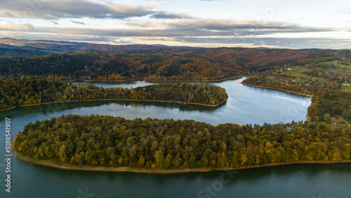 Fototapeta Naklejka Na Ścianę i Meble -  Vibrant Autumn Drone View of Solina Lake and Bieszczady Mountain