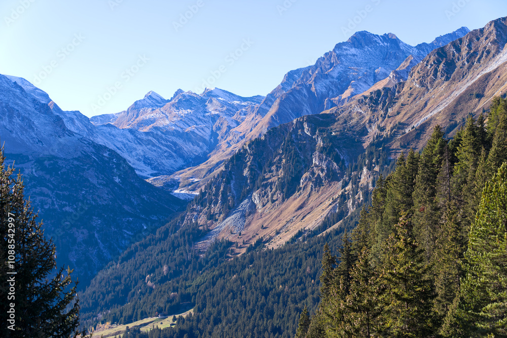Beautiful mountain panorama in the Swiss Alps with Bregaglia Valley seen from viewpoint of mountain village Maloja on a sunny autumn day. Photo taken November 15th, 2024, Maloja, Switzerland. Beautiful mountain panorama in the Swiss Alps with Bregaglia Valley seen from viewpoint of mountain village Maloja on a sunny autumn day. Photo taken November 15th, 2024, Maloja, Switzerland.