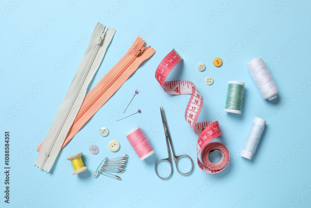 Flat lay composition with different sewing supplies on color background Flat lay composition with different sewing supplies on color background