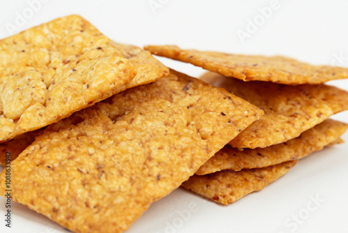 Snacks in gray . homemade gourmet copy concept. stack of small breads on grey with a stack of crumbs. a stack of small snacks on a gray with a stack lifestyle of white bread.