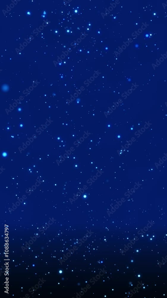 Blue bokeh particles floating in the air and falling to the floor on a dark background, vertical composition. Standard speed. Loop animation footage for graphic design. Blue bokeh particles floating in the air and falling to the floor on a dark background, vertical composition. Standard speed. Loop animation footage for graphic design.