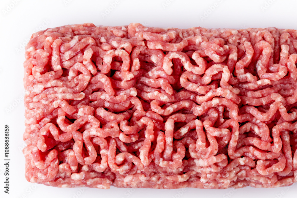 White with minced meat and shaved rib. food fresh beef concept. piece of minced meat on a white . a piece of meat with a piece of pink on it on a white lifestyle. White with minced meat and shaved rib. food fresh beef concept. piece of minced meat on a white . a piece of meat with a piece of pink on it on a white lifestyle.