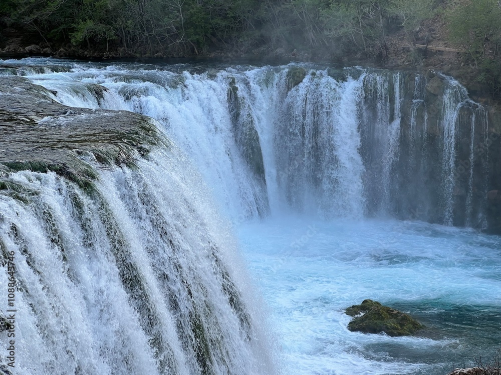Fototapeta premium Visoki buk waterfall on Zrmanja river (Velebit Nature Park, Croatia) - Wasserfall Visoki buk am Fluss Zrmanja (Naturpark Velebit, Kroatien) - Slap Visoki buk na rijeci Zrmanji (Park prirode Velebit)