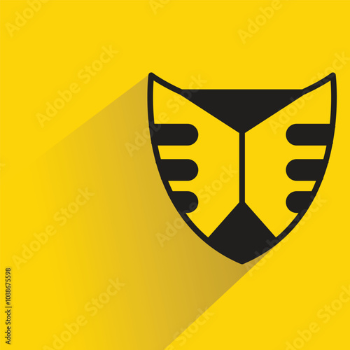 shield badge with shadow on yellow background