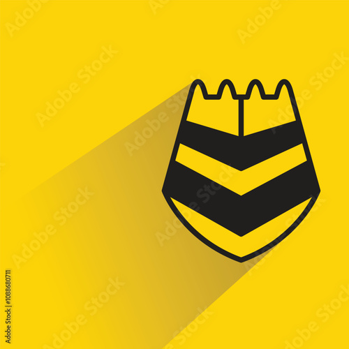 shield badge with shadow on yellow background