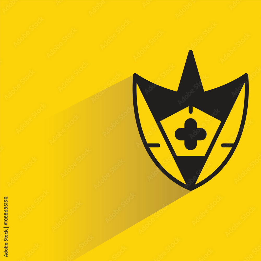 shield icon with shadow on yellow background shield icon with shadow on yellow background
