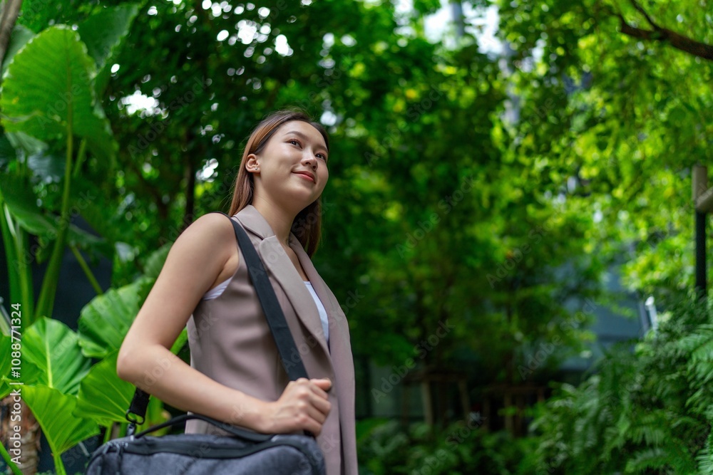 Portrait of a Young Businesswoman Amid Greenery and Tree in A Public Park Portrait of a Young Businesswoman Amid Greenery and Tree in A Public Park