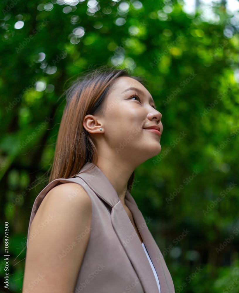 Portrait of a Young Businesswoman Amid Greenery and Tree in A Public Park Portrait of a Young Businesswoman Amid Greenery and Tree in A Public Park