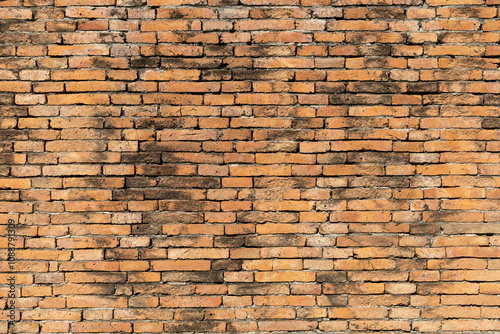 Aged Yellow Brick Wall Texture Background.
