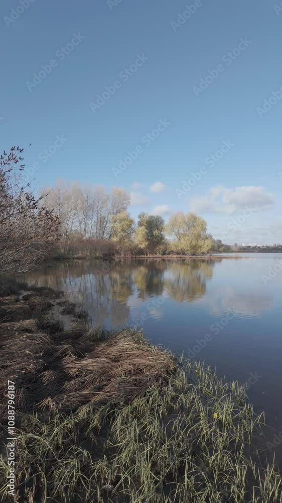 magnificent landscape with reflection in water. clouds and trees reflected in water. beautiful lake. clear river. natural landscape. log profile. flat color profile. sunrise and sunset on the shore. magnificent landscape with reflection in water. clouds and trees reflected in water. beautiful lake. clear river. natural landscape. log profile. flat color profile. sunrise and sunset on the shore.