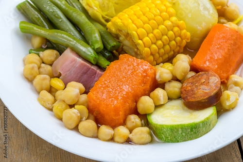 Detalle de un plato de puchero canario con verduras y carne photo