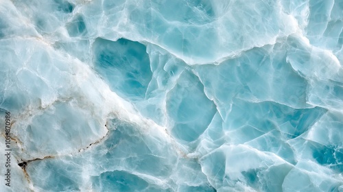 Macro shot of icy blue marble with intricate patterns