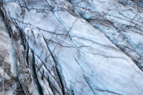 Close-up of intricate textures on a majestic glacier surface photo