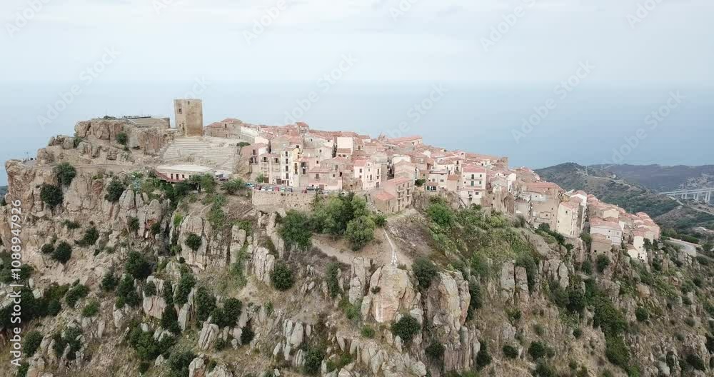 Aerial view, drone flight over Pollina, beautiful town on top of the mountain in Sicily, Italy Aerial view, drone flight over Pollina, beautiful town on top of the mountain in Sicily, Italy