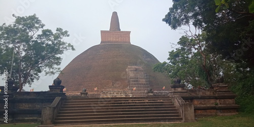 abhayagiriya Stupa – Ancient Buddhist Shrine in Sri Lanka’s Sacred Site. Historic abhayagiriya Stupa an iconic Buddhist Monument in Sri Lanka Anuradhapura. Public Space in Anuradhapura Sri Lanka photo