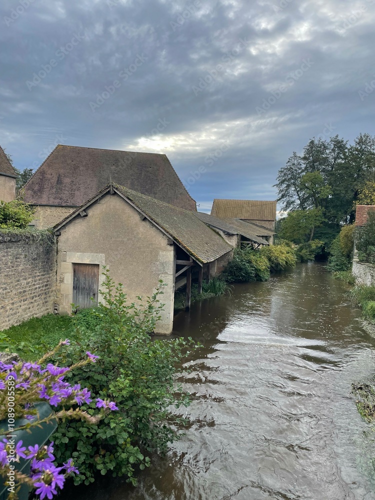 house on the river bank : french countryside house on the river bank : french countryside