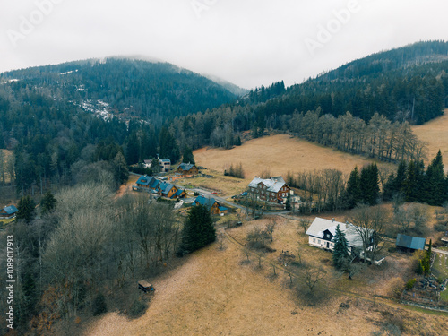 Aerial View of Mountains Village, Valleys, Houses and Hills. Janske Lazne, Czechia photo