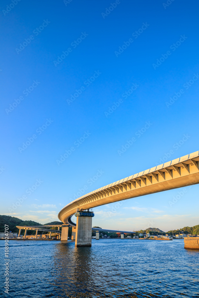 初秋の早朝の牛深ハイヤ大橋 熊本県天草市 Ushibuka Haiya Bridge early in the morning in early autumn. Kumamoto Pref, Amakusa City. 初秋の早朝の牛深ハイヤ大橋 熊本県天草市 Ushibuka Haiya Bridge early in the morning in early autumn. Kumamoto Pref, Amakusa City.